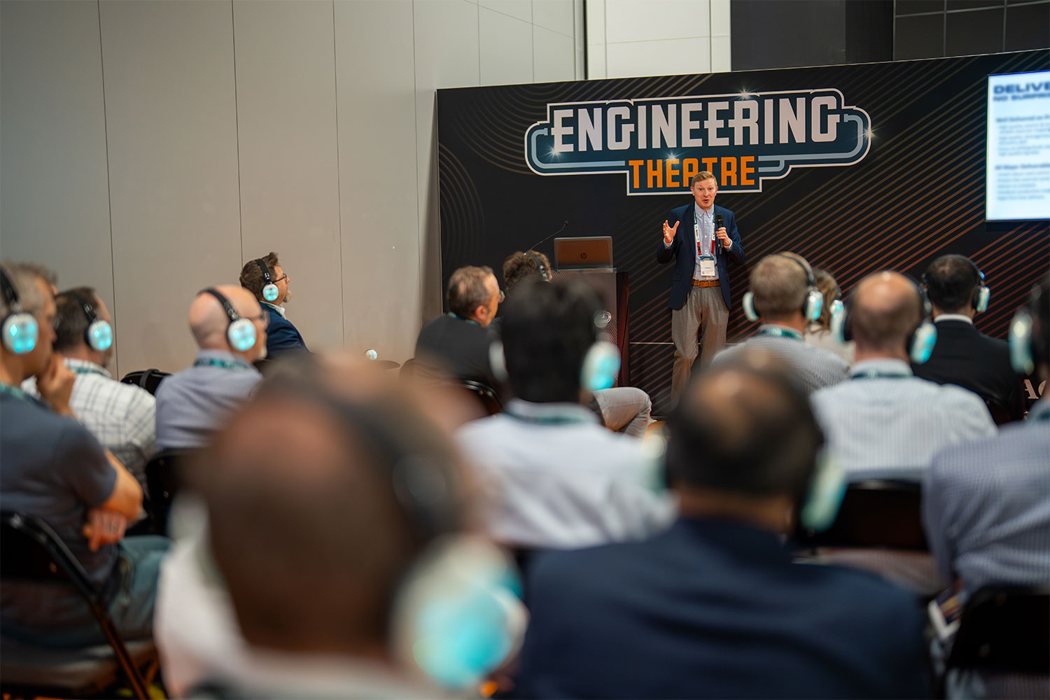 ET area presenter in front of listeners